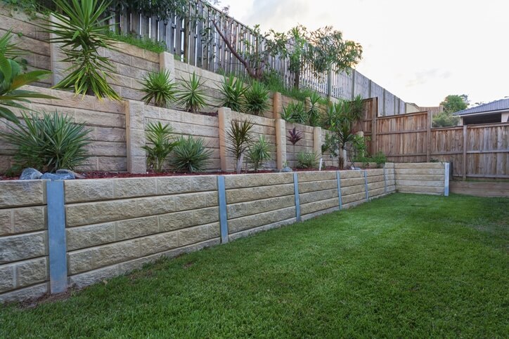 retaining wall sloped backyard ideas on a budget